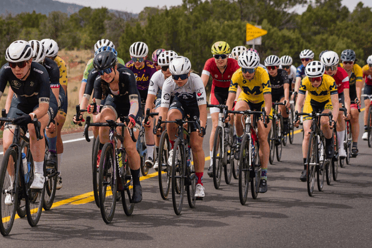 Women’s road cycling peloton racing on an open road